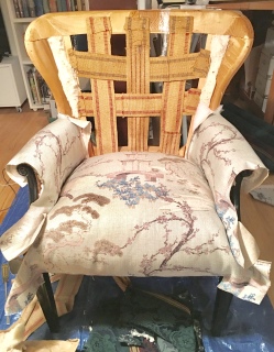 Chair with seat and arms upholstered
